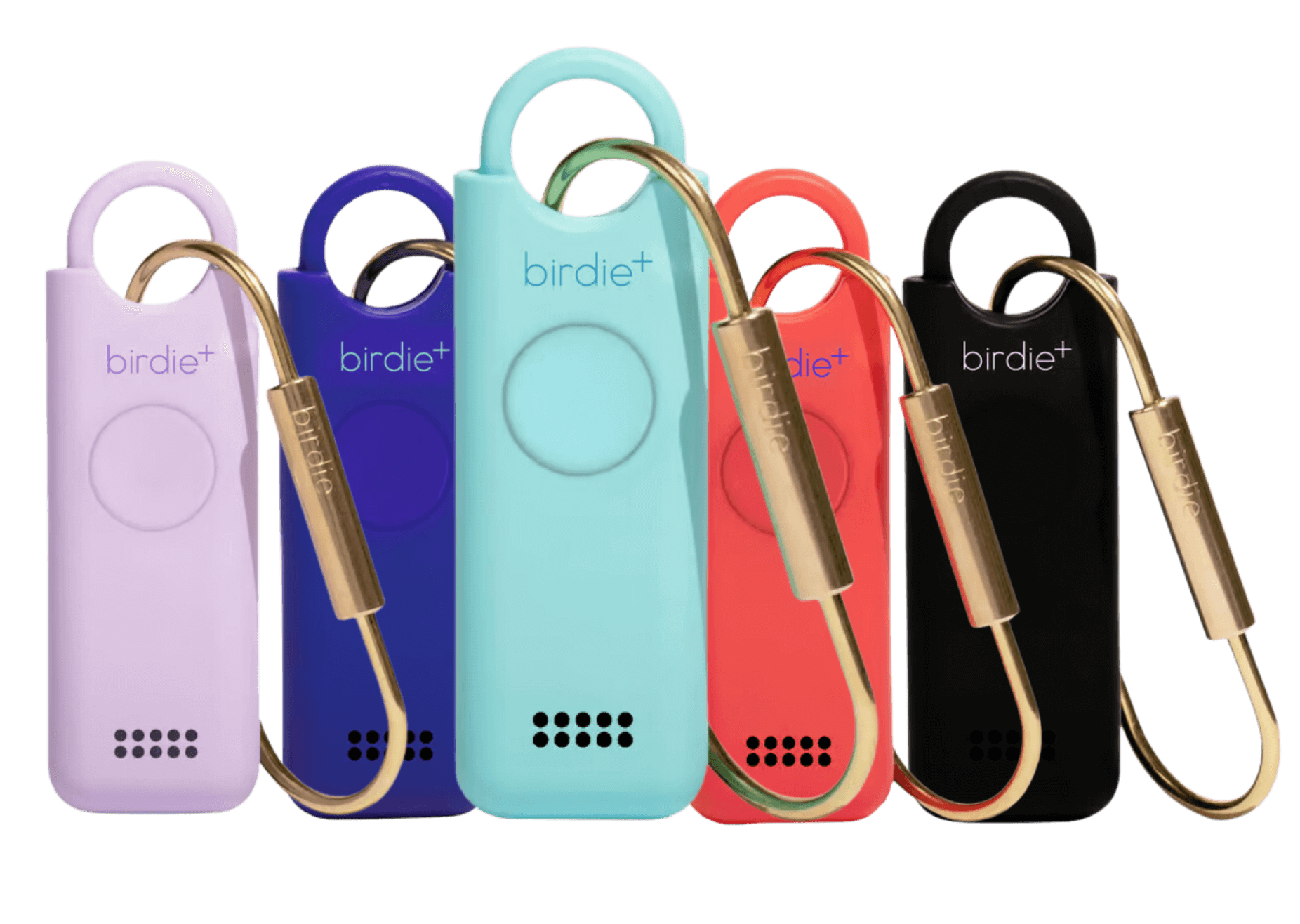 Hand holding three colorful personal safety alarms on keychains against a beige background.