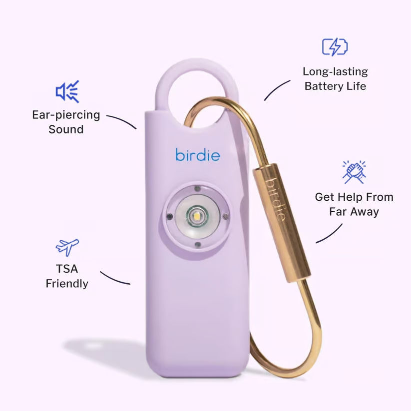 Lavender Birdie personal safety alarm with keychain, featuring long battery life, ear-piercing sound, and TSA-friendly design.